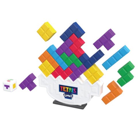 Jeu de Tetris géant : pièces colorées empilées en équilibre sur un socle blanc, avec son dé