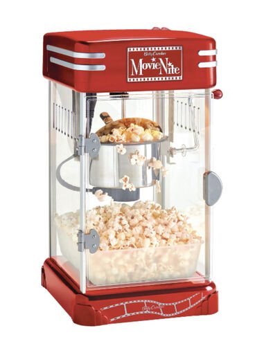 Machine &agrave; popcorn de comptoir rouge de style r&eacute;tro, marqu&eacute;e Movie Nite, sa cuve pleine de ma&iuml;s souffl&eacute;
