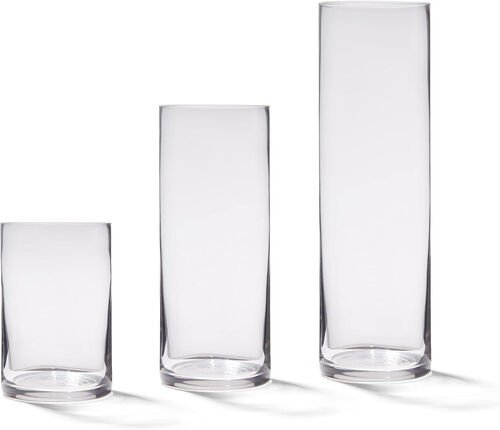 Trois vases cylindriques en verre transparent de trois hauteurs